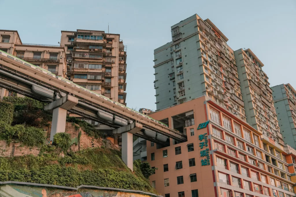 Train that is going through the famous Liziba Station in an apartment building