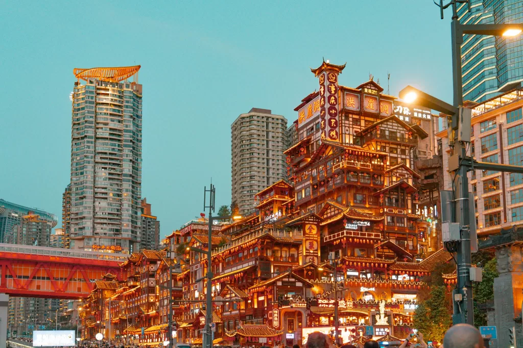 Famous Hongya Cave building lit up at night