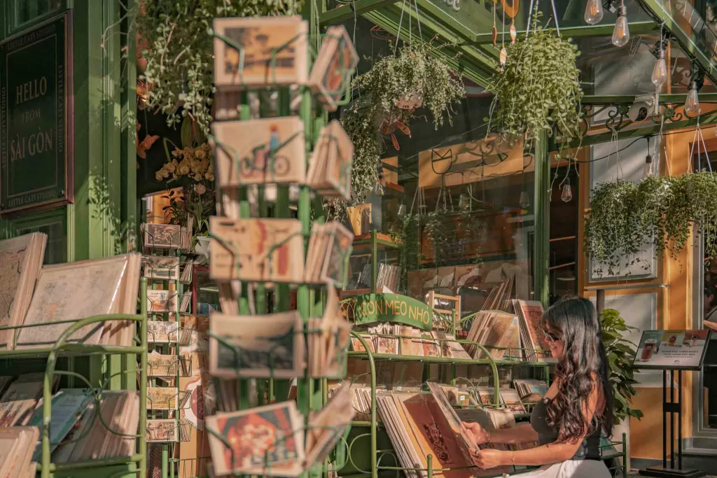 Angelia looking at books on Ho Chi Minh City Book Street